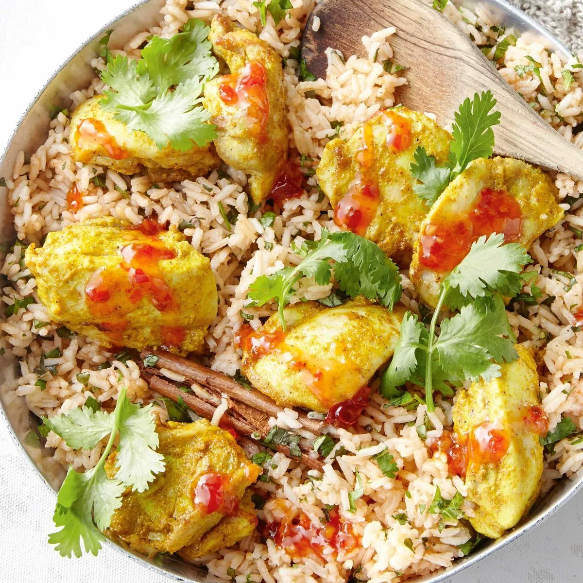 https://img.taste.com.au/mh8io9HS/w1200-h1200-cfill-q80/taste/2016/11/thai-style-biryani-104175-1.jpeg