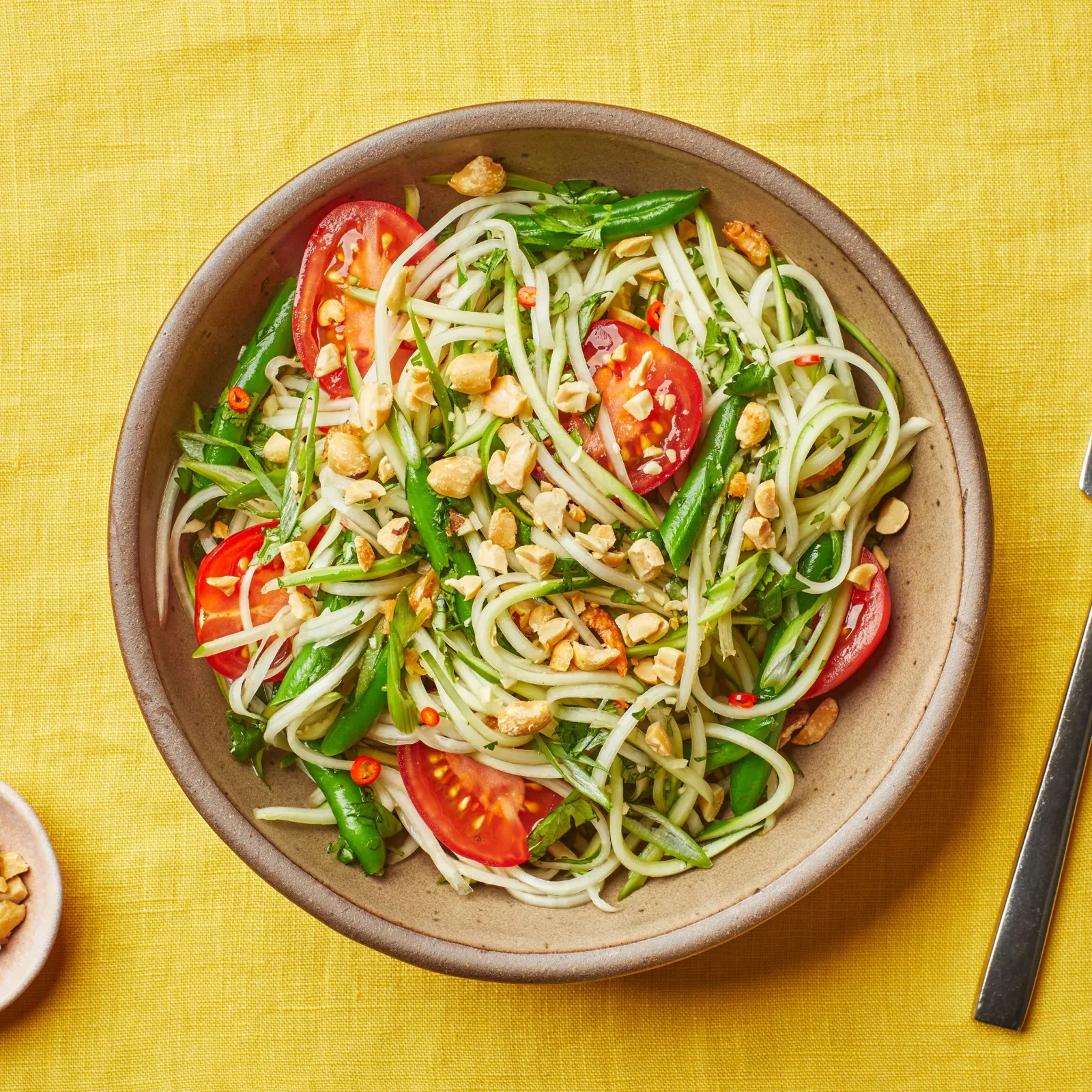 https://assets.bonappetit.com/photos/644819df047251c7e5ee250b/1%3A1/w_2560%2Cc_limit/042523-green-papaya-salad-lede.jpg