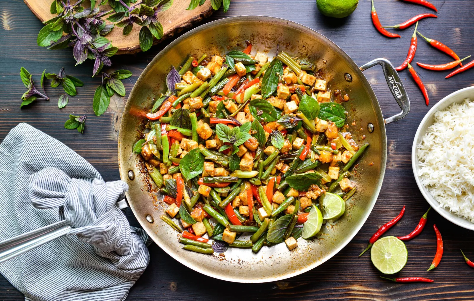 https://assets.nourishingmeals.com/sites/default/files/styles/fullscreen_banner/public/media/SPICY%20STIR-FRIED%20THAI%20BASIL%20TOFU-1.jpg?h=b6100fd8